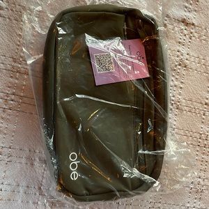 Brand new in package. OBE cross body bag olive green